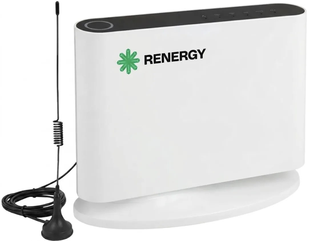 The Renergy gateway, a white desktop unit with status lights along the top edge and a separate magnetic mount whip antenna on a lead.